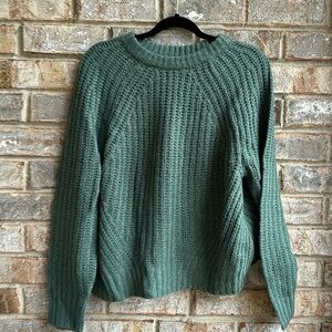 A new day green sweater